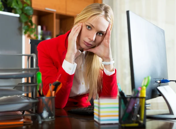 Tired girl in office — Stock Photo, Image