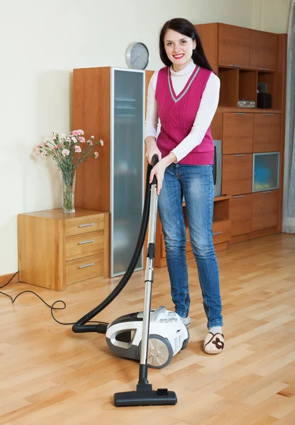 Woman cleaning with vacuum — Stock Photo, Image