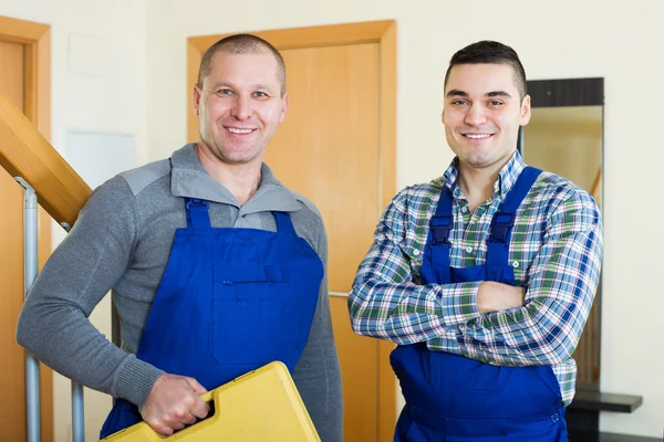 Two workers at doorstep — Stock Photo, Image