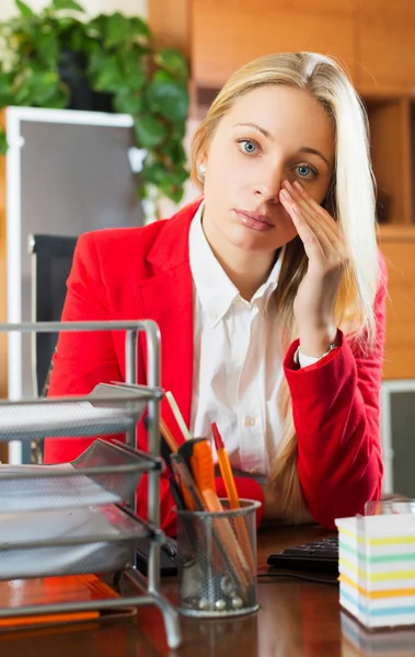 Tired girl in office — Stock Photo, Image