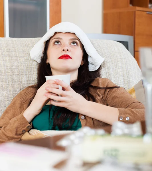 Suffering  brunnette woman at home — Stock Photo, Image