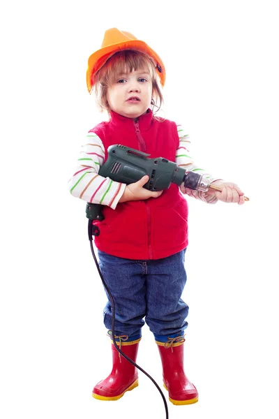 Baby in hardhat with drill — Stock Photo, Image