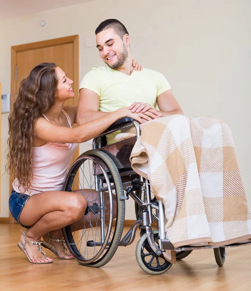 Romantic relationships in invalid chair — Stock Photo, Image