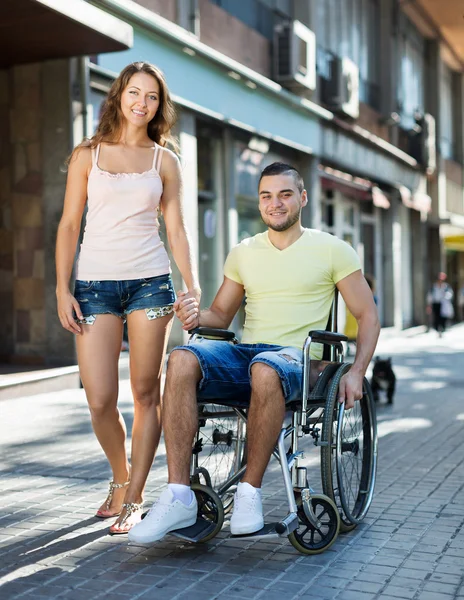 Disabled man in wheelchair outdoor — Stock Photo, Image