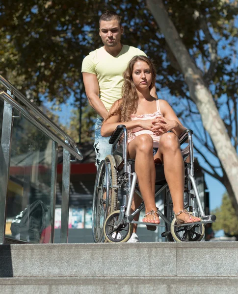 Girl in invalid chair — Stock Photo, Image