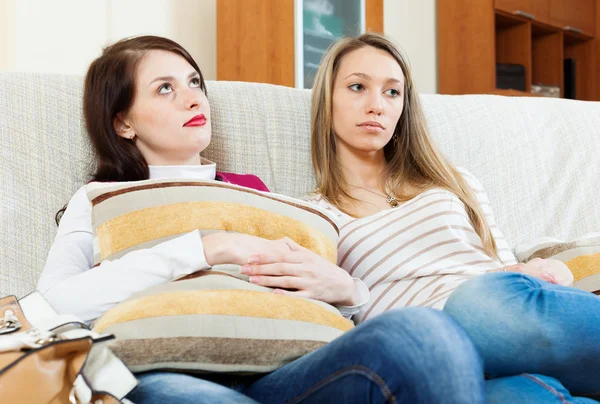 Two depressed girlfriends together — Stock Photo, Image