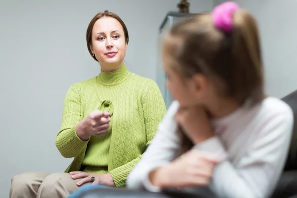 Woman berating daughter in home — Stock Photo, Image