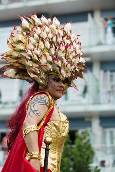 Person in plumage at Gay pride parade in Sitges — Stock Photo, Image