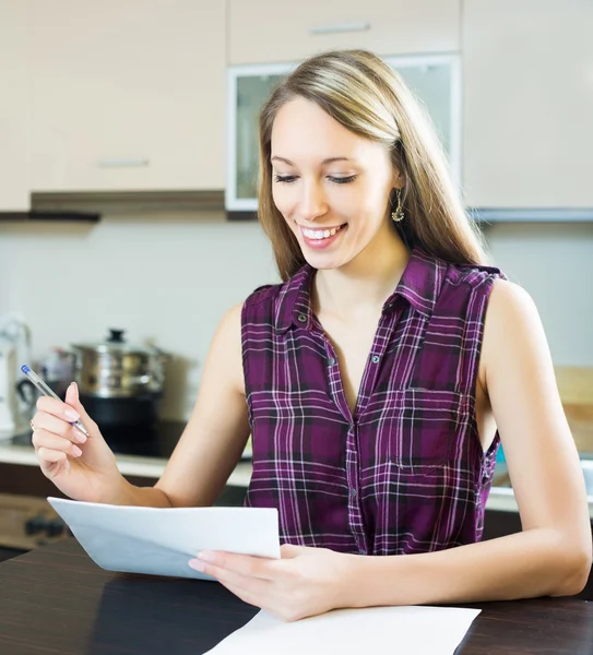 Happy woman with papers — Stock Photo, Image