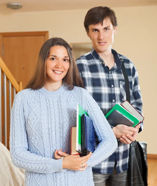 Smiling students at home — Stock Photo, Image