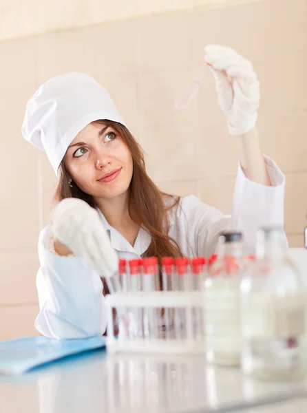 Research worker with test tubes — Stock Photo, Image