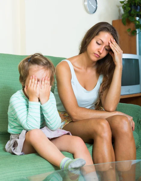 Displeased young nanny and little child — Stock Photo, Image