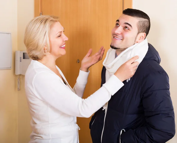 Mature woman and young guy — Stock Photo, Image