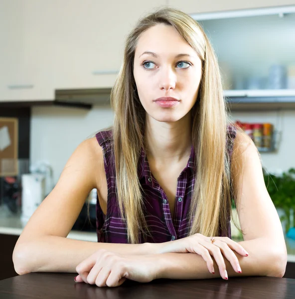 Lonely upset woman in kitchen — Stockfoto