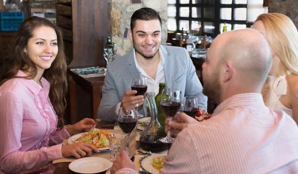 Adults having dinner in restaurant — Stock Photo, Image