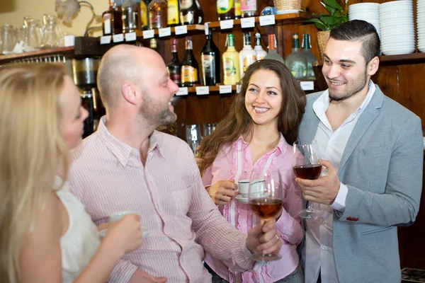Two couples in a bar — Stock Photo, Image