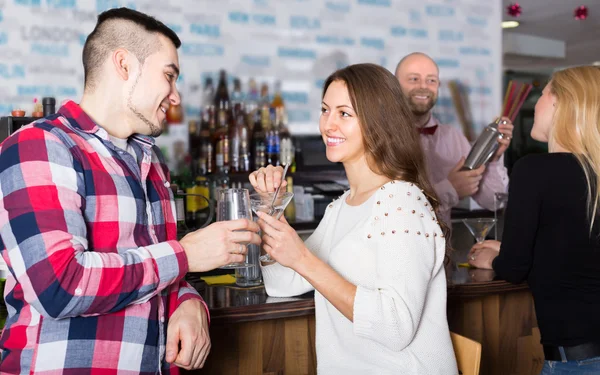 Group of young adults in bar — Stock Photo, Image