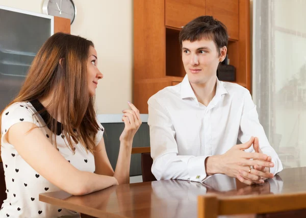 Serious young couple talking — Stock Photo, Image