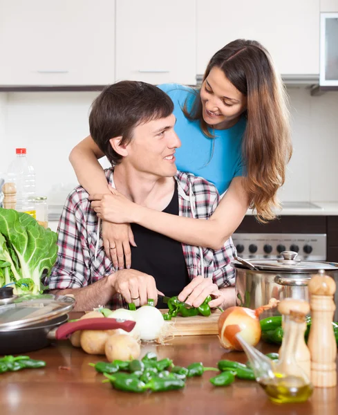 Man and the woman makes a house dinner — Stock Photo, Image