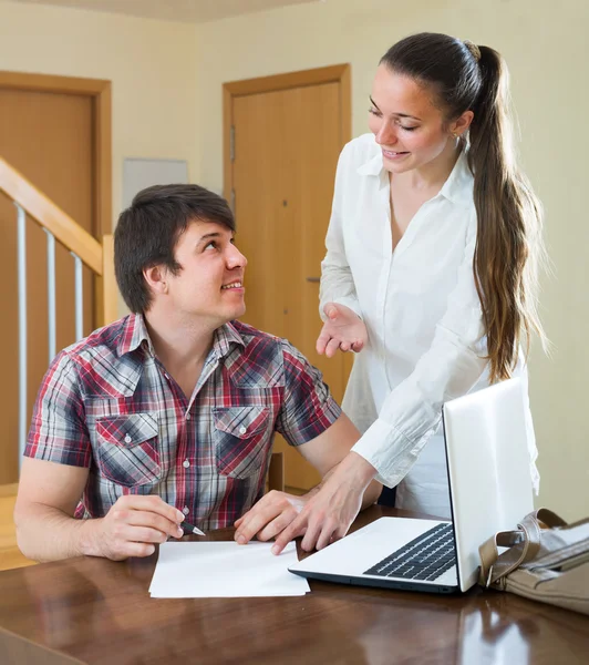 Girl talks with man while interviewing him — Stock Photo, Image