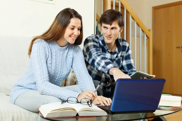 Students doing homework with laptop — Stock Photo, Image