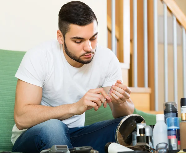 Man using nail file — Stock Photo, Image