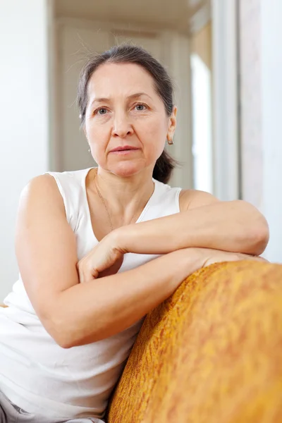 Wistful beauty mature woman in home — Stock Photo, Image