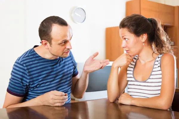 Family couple having serious conversation — Stock Photo, Image