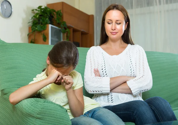 Woman berating crying daughter — Stock Photo, Image