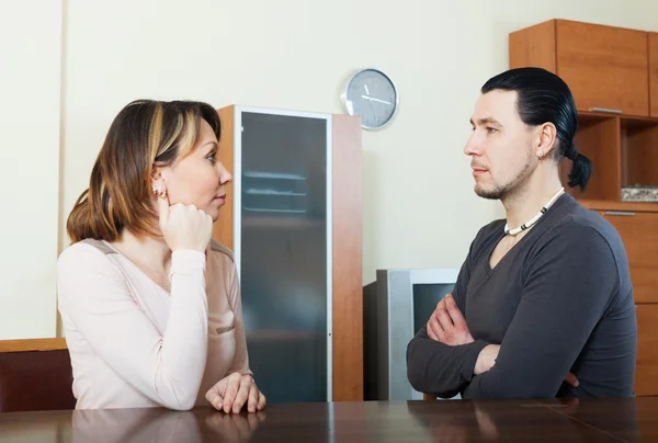 Serious couple talking at home — Stock Photo, Image