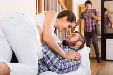 Husband watching how partner is cheating clipart