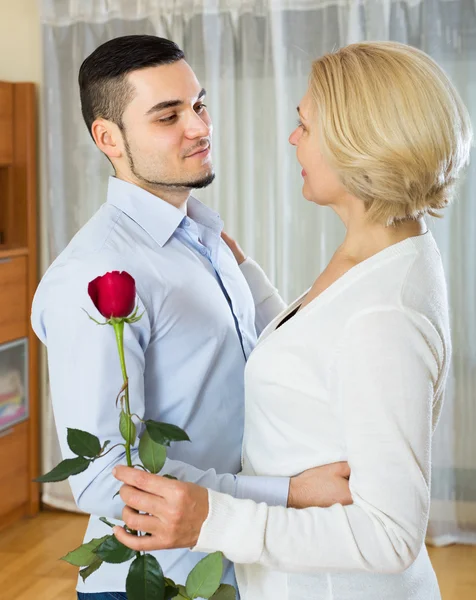 Young man and aged woman dancing — Stock Photo, Image