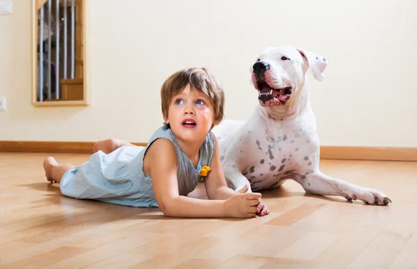 Little girl with big white dog — Stock Photo, Image