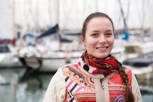 Girl outdoors and yachts — Stock Photo, Image