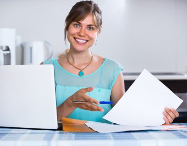 Smiling woman with documents clipart