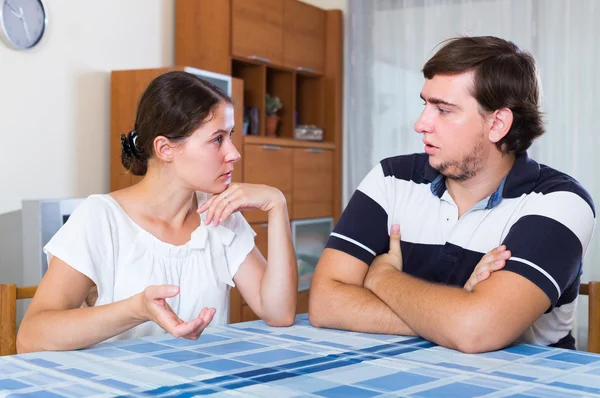 Serious talking between couple at home — Stock Photo, Image