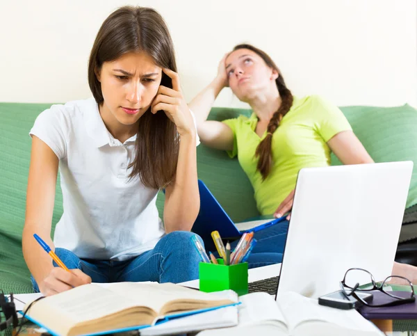 Sad students studying — Stock Photo, Image