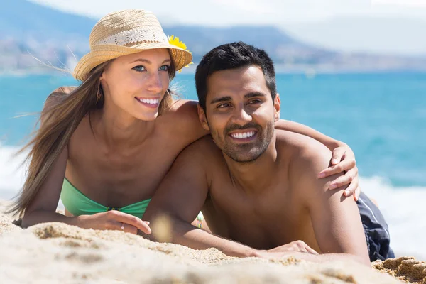 Couple of lovers on sandy beach — Stock Photo, Image