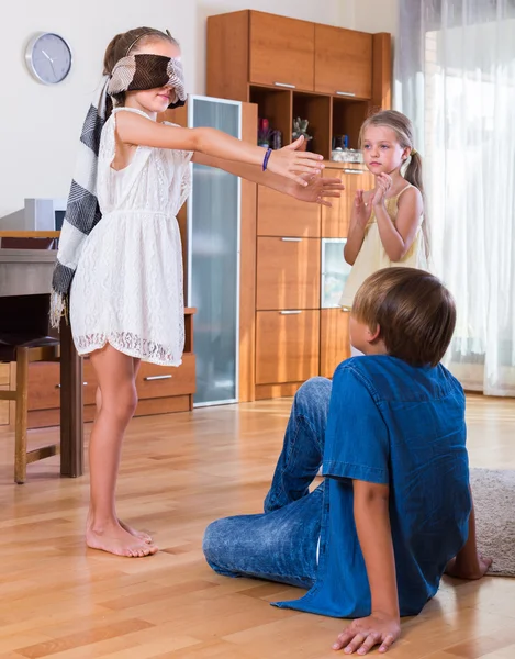 Happy kids playing with blindfold — Stock Photo, Image