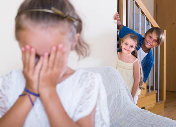 Boy with sisters playing hide-and-go-seek — Stock Photo, Image