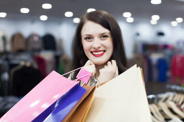 Girl at clothing shop — Stock Photo, Image