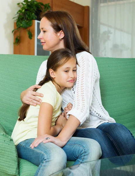 Woman comforting sad  little daughter — Stock Photo, Image