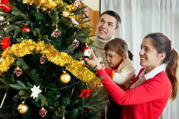 Familia feliz de tres — Foto de Stock