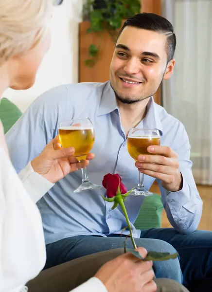 Adult son and senior mother with wine — Stock Photo, Image