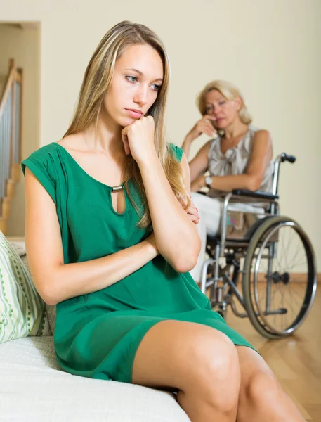 Upset woman and handicapped — Stock Photo, Image