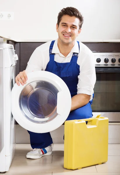Specialist with tooling near washing machine — Stock Photo, Image