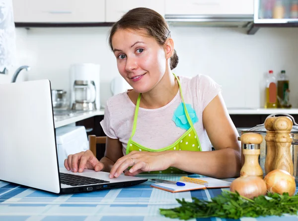 Woman looking for new recipe — Stock Photo, Image