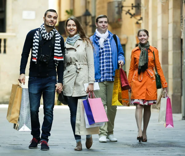 Group of adults with shopping bags — Stock Photo, Image