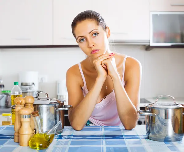 Tired woman at the kitchen — Stock Photo, Image