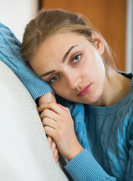 Unhappy ordinary adult female on couch — Stock Photo, Image